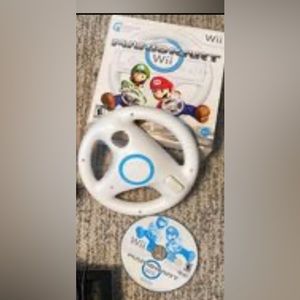 Wii Mario kart game and wheel accessory